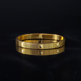 Love Bracelet – Gold-Plated Flexible Bangle with Textured Finish