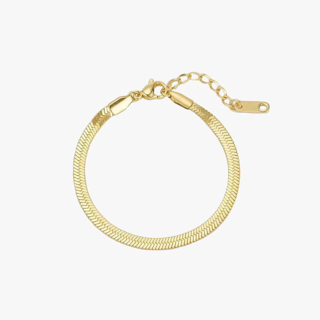 Gold bracelet on a white background