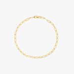 Gold chain bracelet on a white background