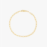Gold chain bracelet on a white background